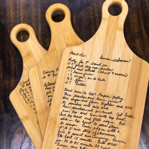 Bamboo handle cutting boards with handwritten recipe engraved