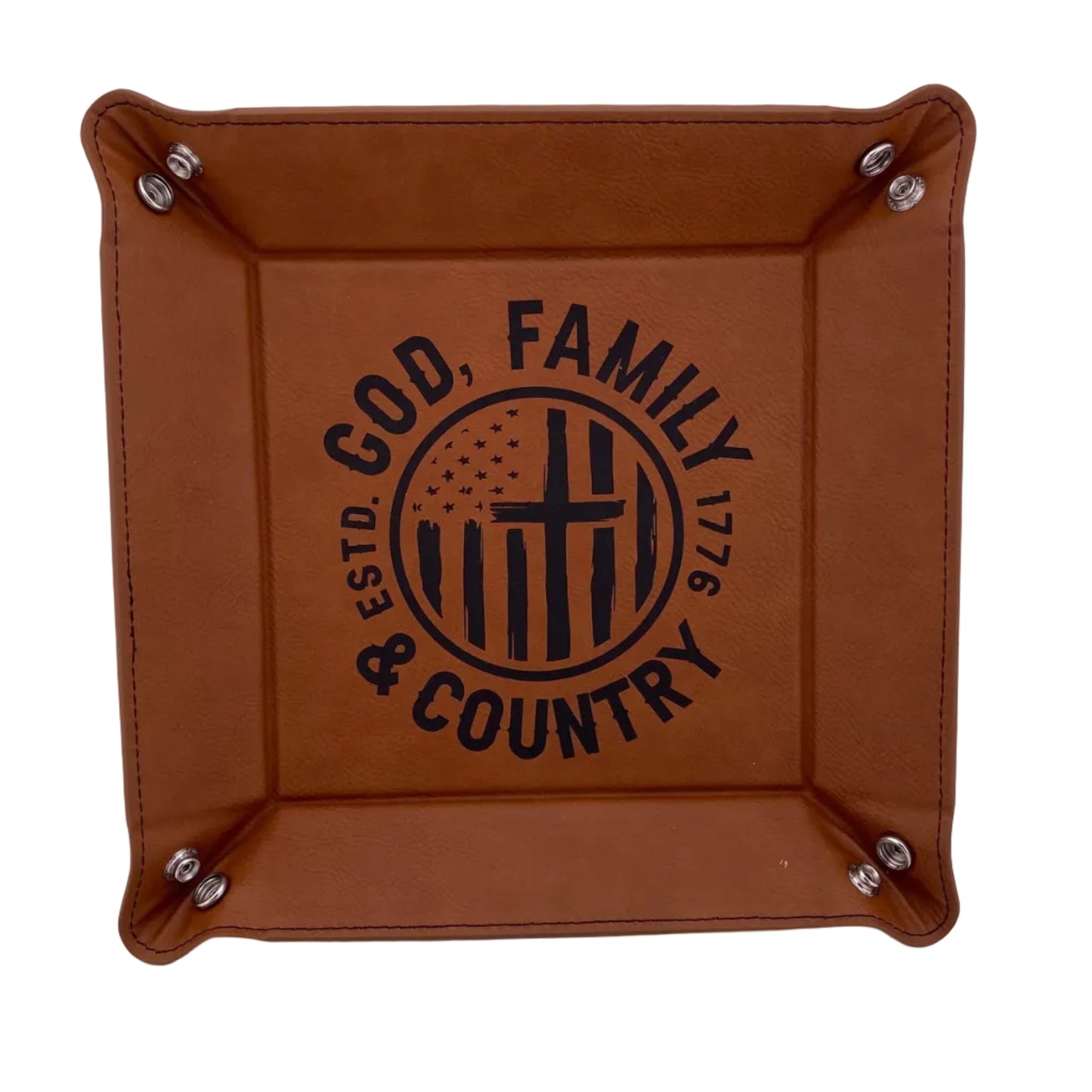 Brown leather tray with 'Family Country God' text on a white background