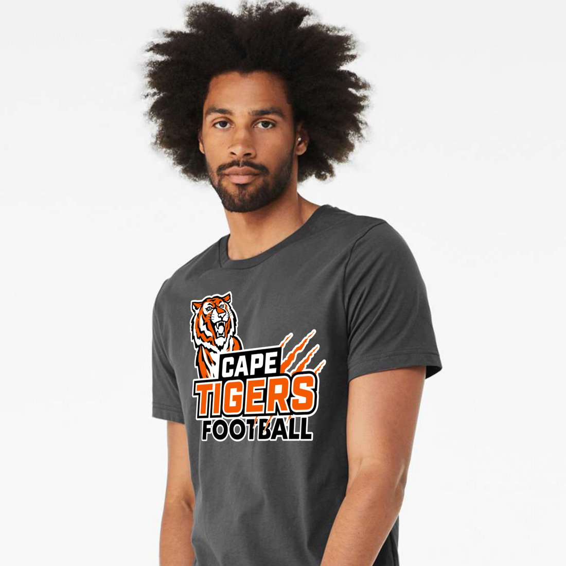 Man wearing a gray t-shirt with 'Scape Tigers Football' design on a white background