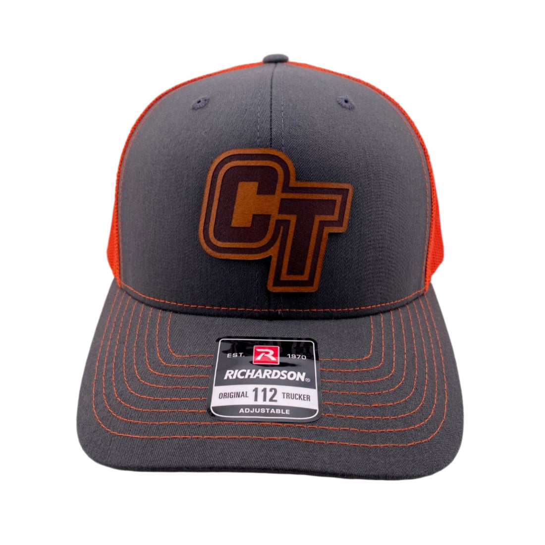 Gray and orange cap with a logo on a light gray background