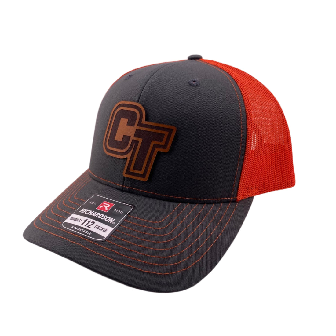 Black and orange cap with 'GT' logo on a light gray background