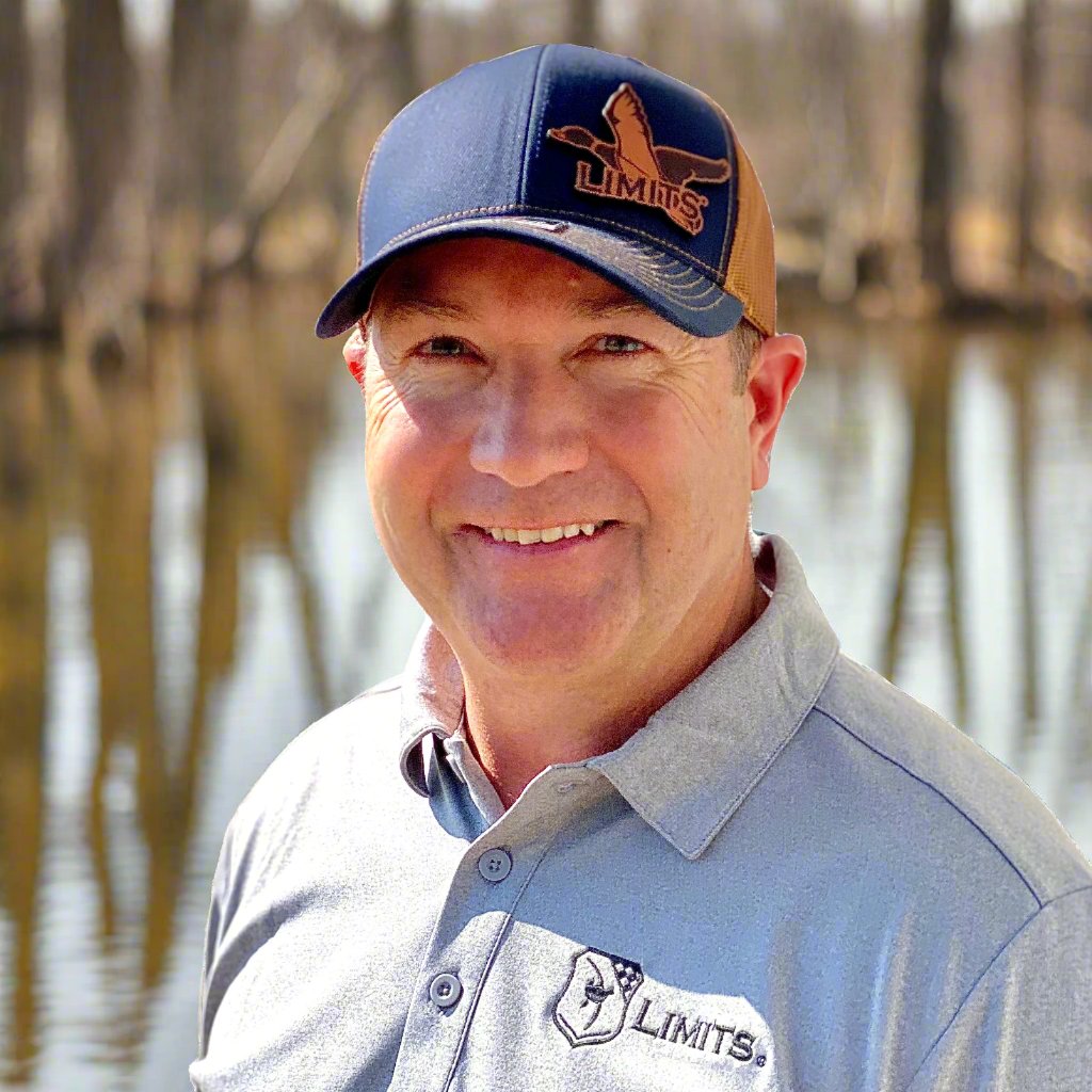 Navy and Caramel Richardson 112 Leather patch hat with the words Limits overlaying on a Mallard Duck image. 