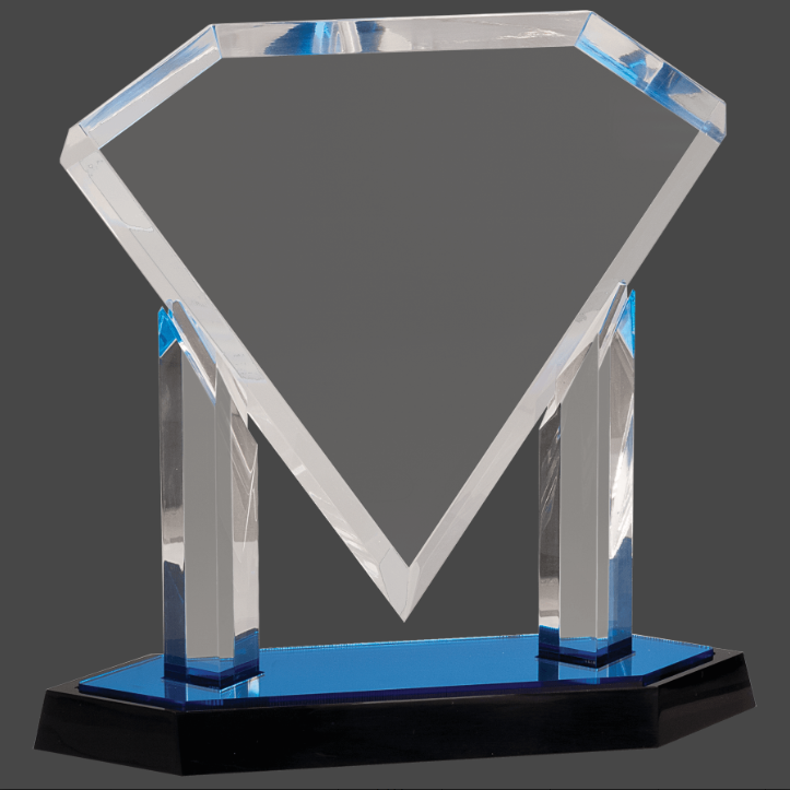 An acrylic award in the shape of a diamond with a reflective surface, featuring a personalized engraving plaque on a mirror base, primarily in blue color.