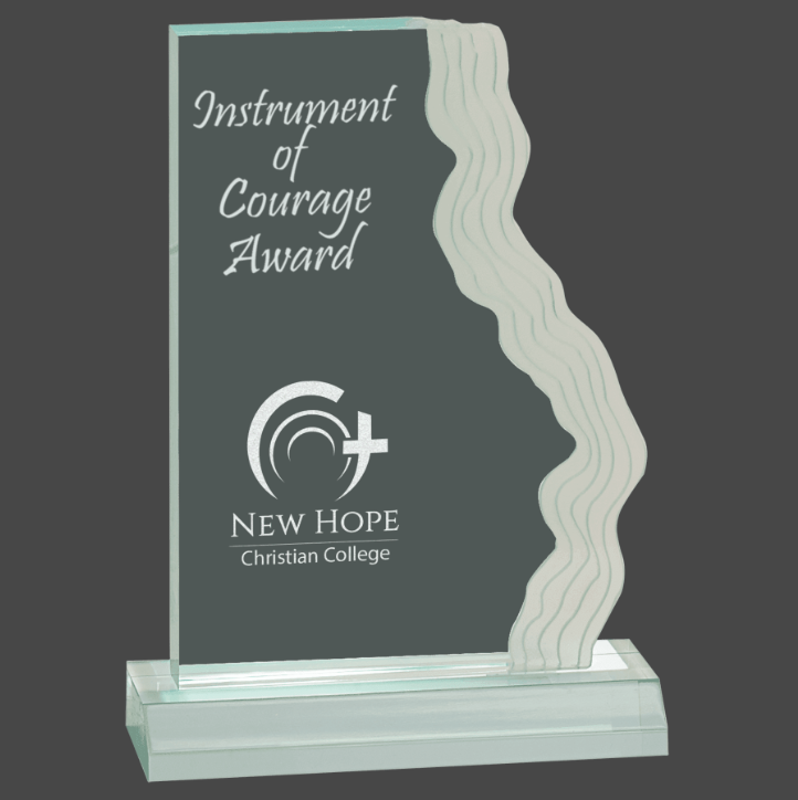 An acrylic award with a frosted waterfall edge design, featuring a plaque with the text 'INSTRUMENT OF COURAGE AWARD' and the logo of New Hope Christian College.