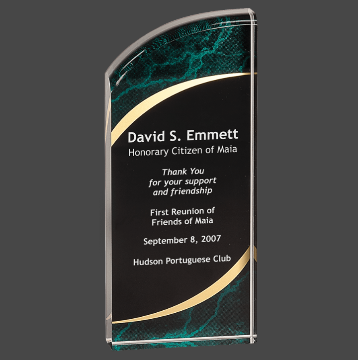 A green marbleized acrylic award with a black and gold engraving plate.