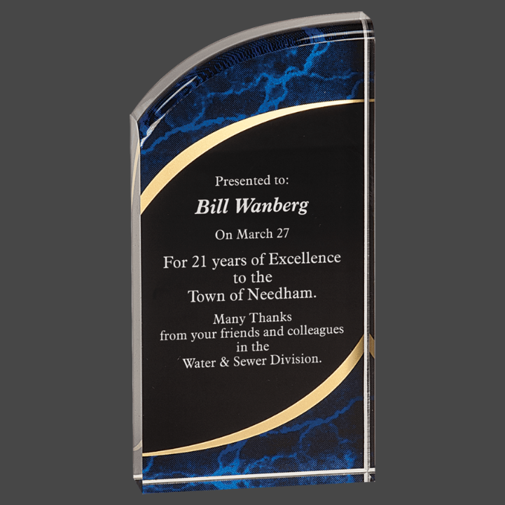A blue marbleized acrylic award with a black and gold engraving plate.