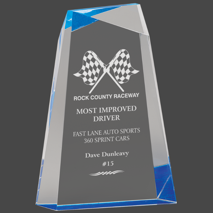 A blue-colored column acrylic award column design and a blue base, featuring engraved text.
