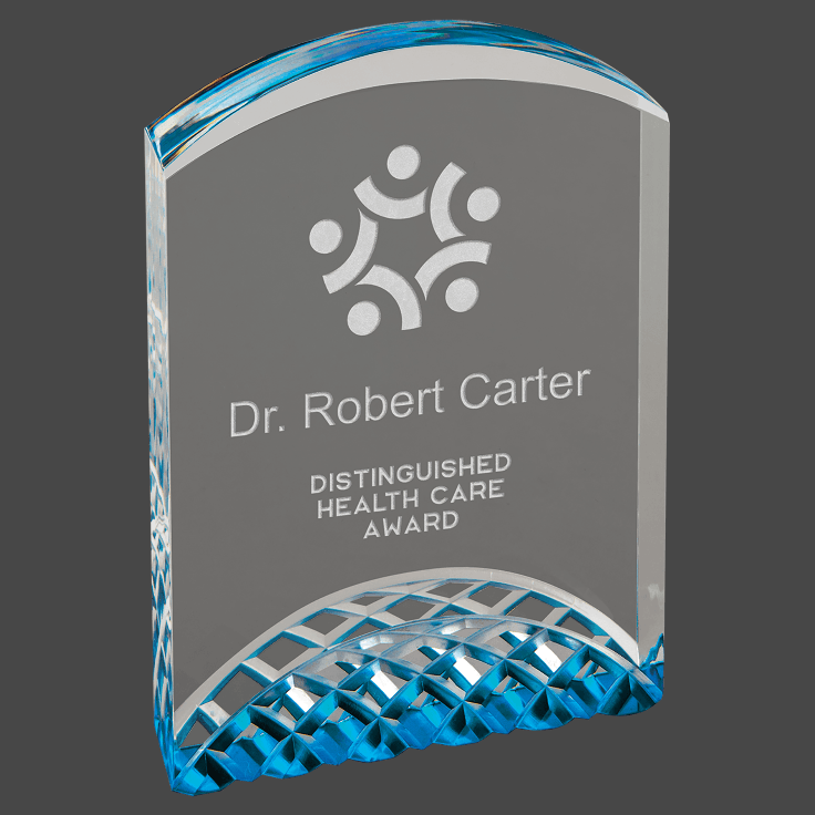 A blue acrylic award with a custom laser engraving of a logo and text that reads 'Dr. Robert Carter Distinguished Health Care Award'.