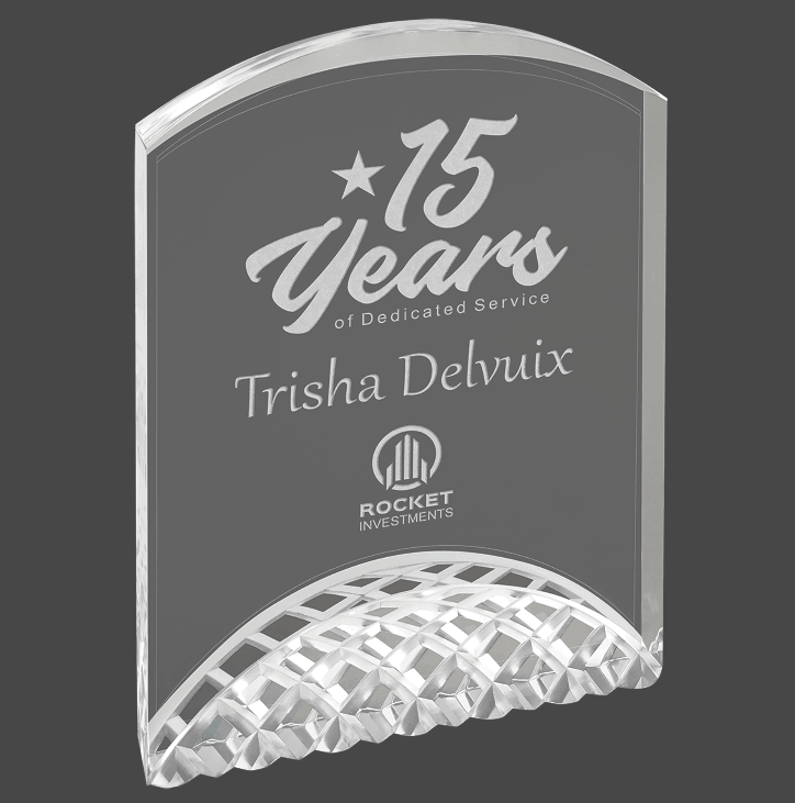 A Silver acrylic award with a custom laser engraving of a logo and text