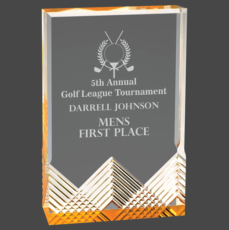 An acrylic award with a gold and black design, featuring text that acknowledges a first place finish in a golf league tournament.