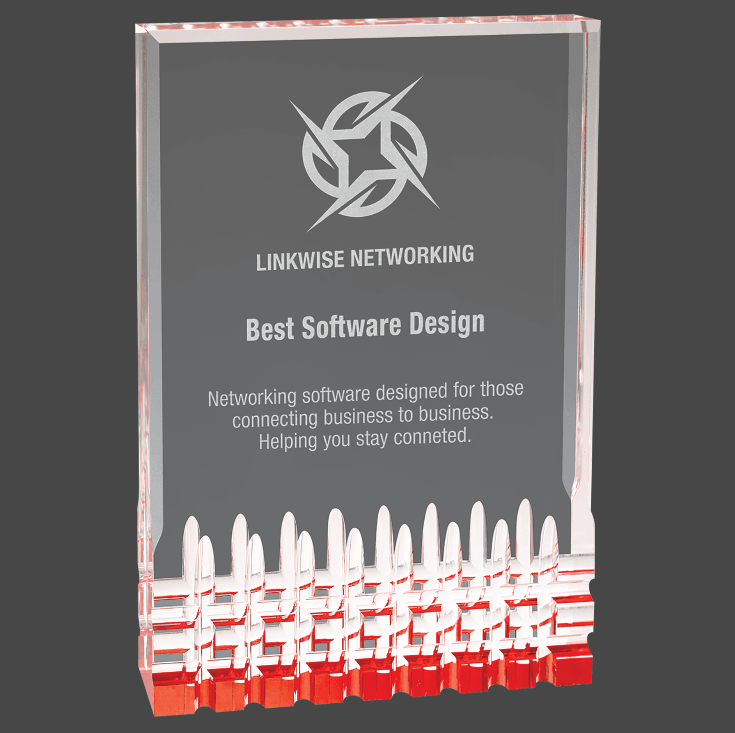 A Red and Clear acrylic award with a custom laser engraving of a logo and text