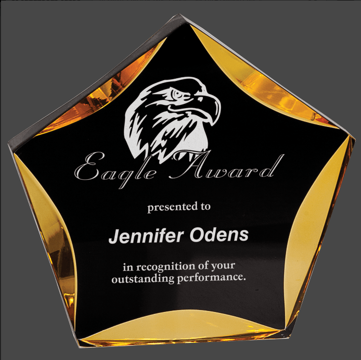 A black and Gold luminary star acrylic award with custom laser engraving .