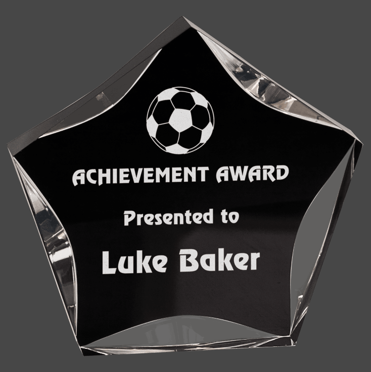 A black and clear acrylic luminary star award with custom laser engraving text and logo.