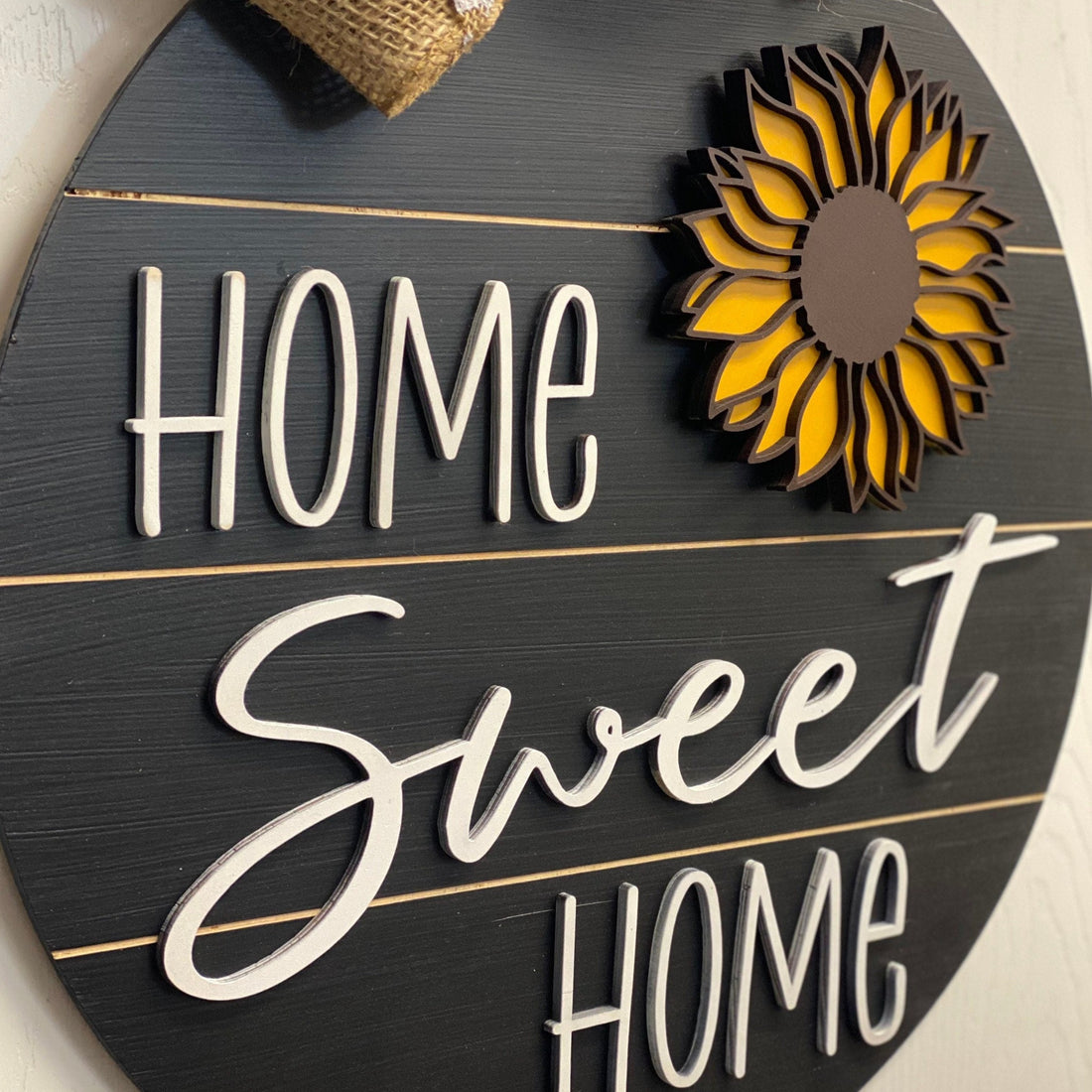 Home sweet home door hanger is hand  crafted and painted  and adds a beautiful touch to your decor.  